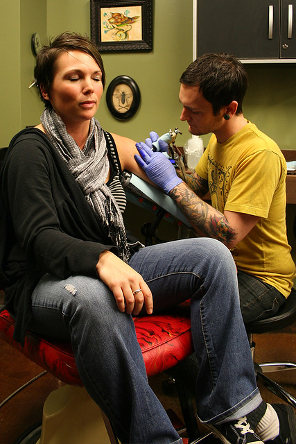 Kari getting tattooed by Joshua Bowers